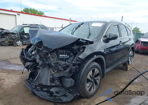 2015 Honda Cr-V Touring z USA, uszkodzony, nr VIN 5J6RM4H98FL078503